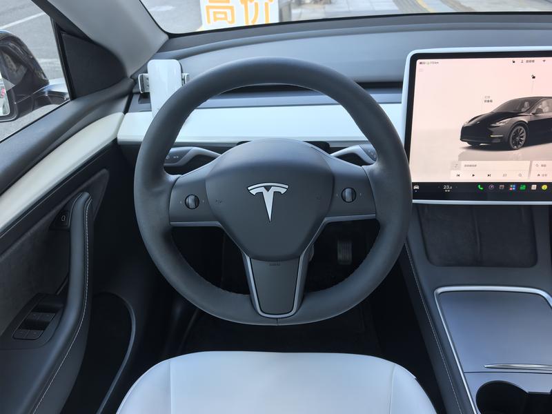 Tesla Model Y, 2023 — фото 8 из 12