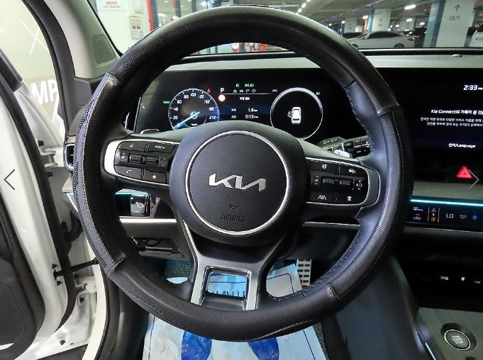 Kia Sportage, 2023 — фото 7 из 12