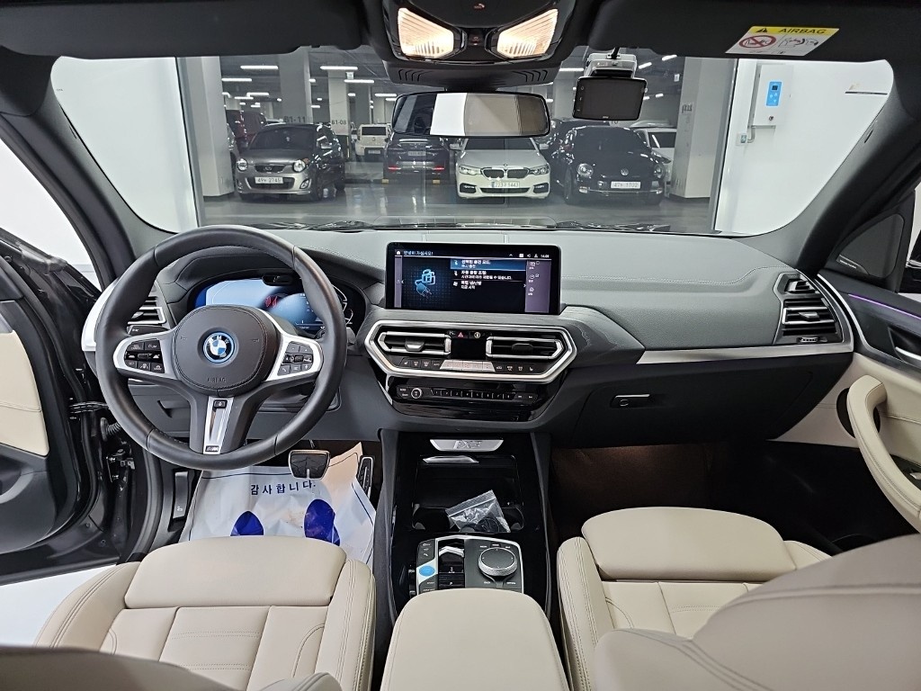 BMW iX3, 2025 — фото 6 из 12