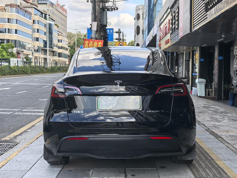 Tesla Model Y, 2023 — фото 5 из 12